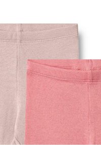 Deux paires de leggings : une rose clair et une rose foncé. Fabriquées en tissu côtelé avec des tailles élastiques.