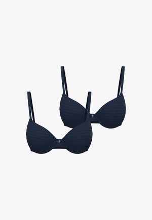 Zwei marineblaue gepolsterte BHs mit dünnen verstellbaren Trägern und dezenten horizontalen Streifen, vor weißem Hintergrund präsentiert.