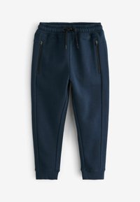 Pantalons de jogging bleu marine avec une taille élastique, un cordon de serrage ajustable et deux poches latérales zippées. Tissu lisse avec des poignets côtelés.