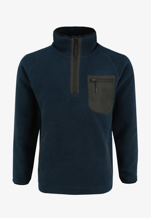 Tumesinine fliispullover, millel on poolsuretav krae, must rinnatasku ja tekstureeritud kangas. Küljepockets on lisatud.