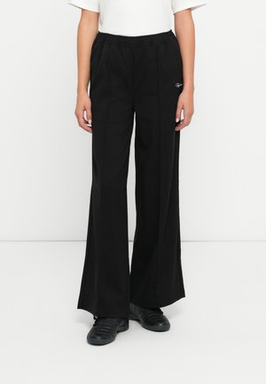 NILAY LOOSE - Trousers - black
