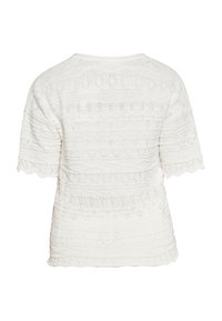 Pullover bianco a maglia con maniche corte, modelli testurizzati e piccoli accenti di perline. Presenta un collo arrotondato e bordi delle maniche a scallop.