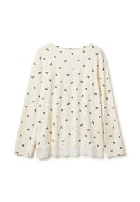 Kremowa bluzka z długim rękawem z rozproszonym kwiatowym wzorem w odcieniach zieleni i czerwieni. Posiada koronkowy dół. Miękka tekstura, casualowy design.