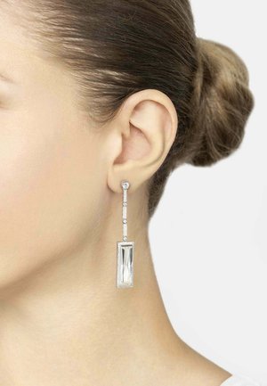 Silver dangle earrings featuring a rectangular crystal surrounded by small diamonds, with a straight line of gemstones above.
