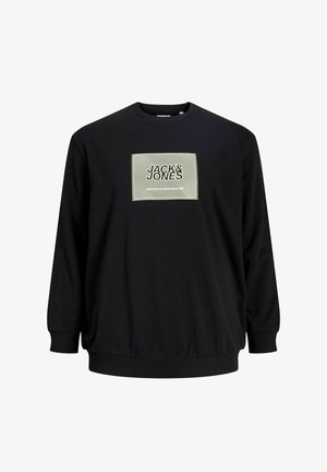 Svart genser med lange ermer, ribbede mansjetter og nederkant. Har en rektangulær logo med teksten "JACK & JONES" på forsiden.