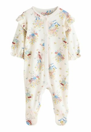 Kremni otroški pajac z zapenjanjem na gumbe, z barvnimi vzorci zajčka in cvetja, nabranimi rameni ter dolgimi rokavi z elastičnimi manšetami.