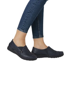 Navy slip-on shoes made of textured leather with elastic panels and stitching details. Features a low black rubber sole for flexibility.