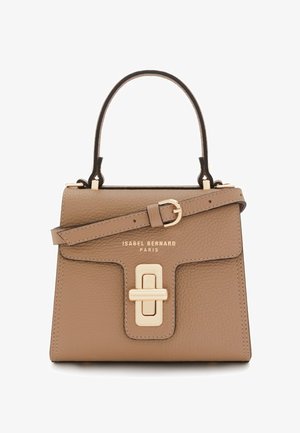 Sac à main en cuir tan avec une forme structurée, poignée supérieure, bandoulière amovible, quincaillerie dorée et un détail de fermoir frontal proéminent.
