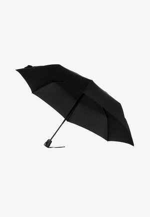 Black compact umbrella open with straight handle and wrist strap, isolated on white background.