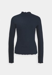 Mörkblå långärmad topp med en figursydd design, ribbad textur och vågiga kanter vid halsringning och ärmar. Inga synliga knäppningar eller mönster.