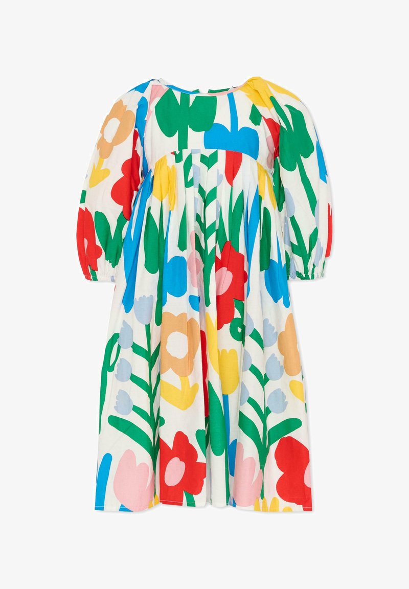 Vestito a maniche lunghe per bambini con sfondo bianco e motivo floreale oversize colorato in rosso, giallo, blu, verde, rosa e beige.