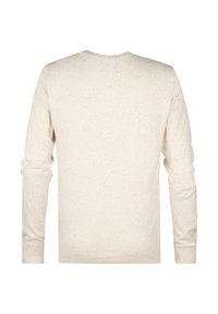 Crème sweatshirt met lange mouwen en een gespikkeld patroon van roze, groen en blauwe stippen. Zachte textuur en geribbelde manchetten en halslijn.