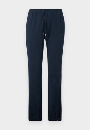 Pantalones de color azul marino hechos de un tejido suave, con una cinturilla elástica y cordón, y piernas ajustadas con puños elásticos.