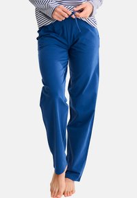Blauwe, elastische broek met een trekkoord; lichtgewicht stof, ontspannen pasvorm, licht toelopende benen, geen zichtbare patronen of hardware.