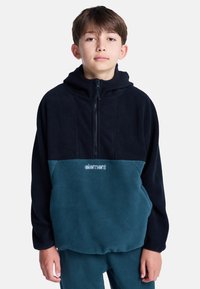 Fleece pullover met een ritssluiting in de hals, donker marineblauw bovenstuk en een teal onderstuk. Voorzien van het "element" logo in witte steek. Zachte textuur.