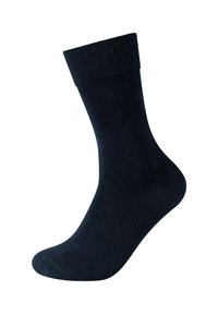 Dunkelblaue Socke aus einem glatten, gerippten Stoff. Verfügt über einen hohen Schaft und ein nahtloses Zehendesign für zusätzlichen Komfort.