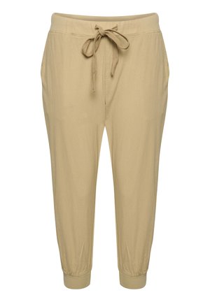 Pantalons beige légers à taille cintrée avec un waistband élastique, cordon de serrage ajustable, poches latérales et jambes élastiques aux chevilles.