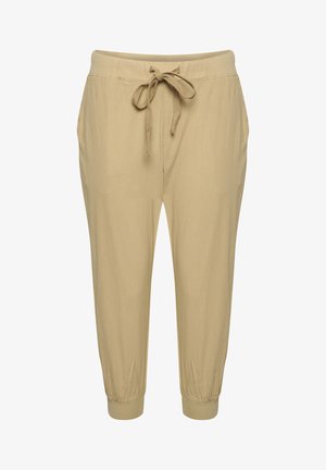 Beige letvægts tapered bukser med elastisk talje, justerbar snøre, sidelommer og elastiske manchetter ved anklerne.