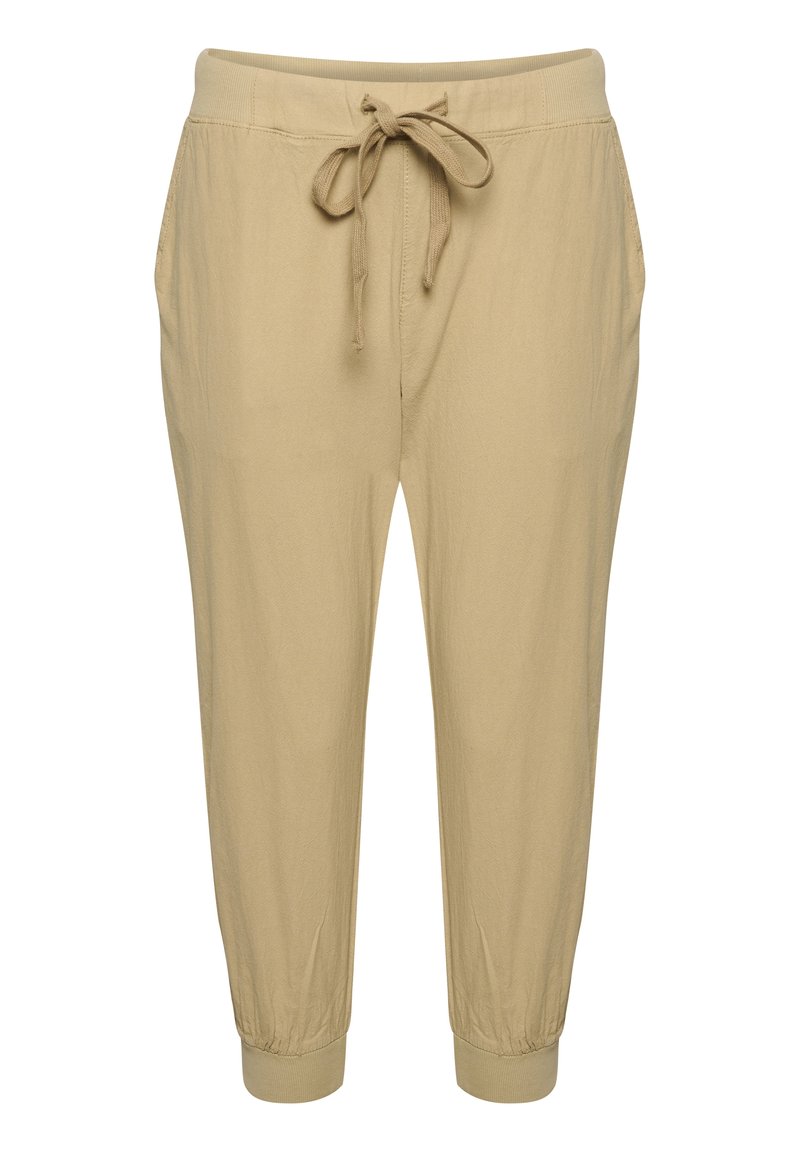 Beige lichtgewicht taps toelopende broek met een elastische tailleband, verstelbaar trekkoord, zijzakken en elastische boorden bij de enkels.