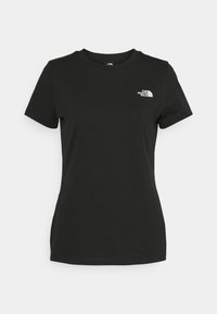 T-shirt nero aderente a maniche corte con colletto a girocollo e piccolo logo bianco di The North Face sul lato sinistro del petto.