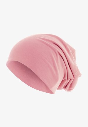 Vaaleanpunainen pipo, joka on valmistettu pehmeästä, joustavasta kankaasta ja jonka muotoilu on löysä. Pipossa on lempeitä laskoksia ja sileä pinta koko ajan.