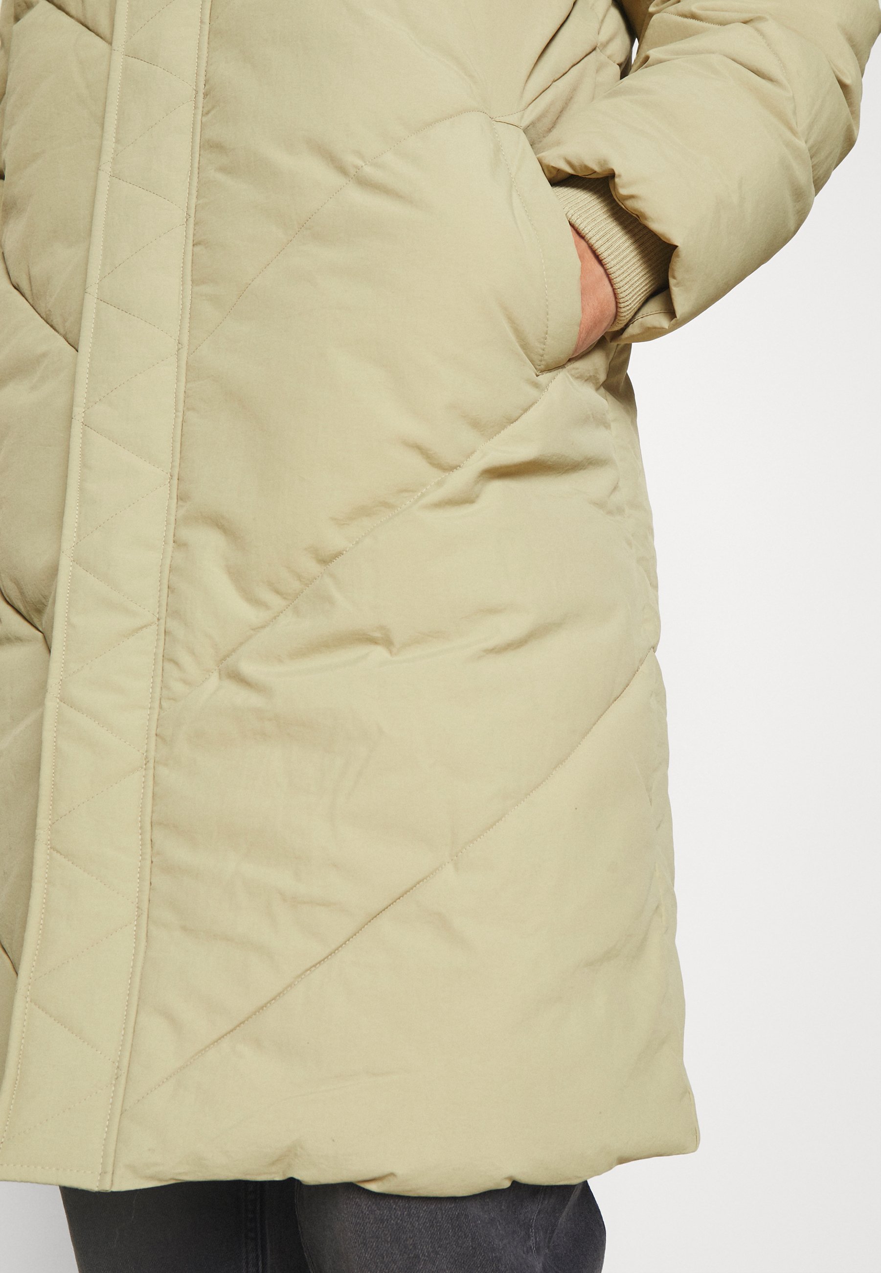 mid length quilted jacket