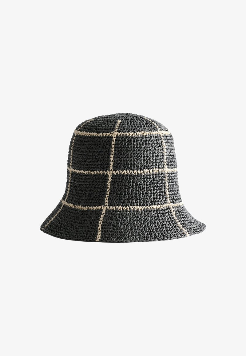Chapeau bob tissé noir avec motif en quadrillage blanc et bord légèrement évasé, présenté sur fond blanc.
