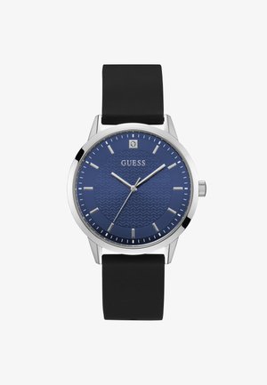 Blaue Zifferblatt-Uhr mit strukturiertem Muster, silbernem Gehäuse, schwarzem Gummiband sowie silbernen Stundenmarkierungen und Zeigern. Markenlogo angezeigt.