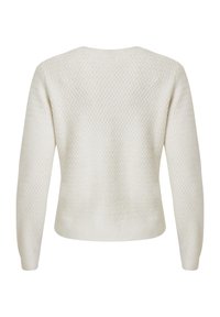 Ljusbeige stickad tröja med texturerat mönster, långa ärmar och rundad halsringning. Sömmen är ribbad för en snug passform.