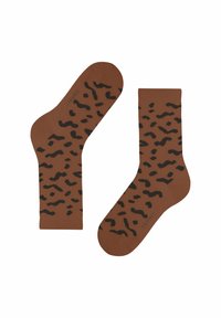 Braune Socken mit einem schwarzen abstrakten Leopardenmuster, die eine weiche Textur und ein Design in mittlerer Knöchelhöhe aufweisen. Mit "ESPIRIT" gekennzeichnet.