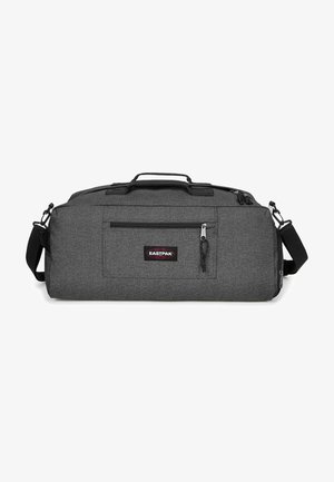 Gray duffel bag made of textured fabric, featuring two top handles, a detachable shoulder strap, and a front zip pocket with a logo patch.