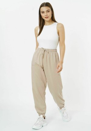 PASTEL - Tracksuit bottoms - biscotti