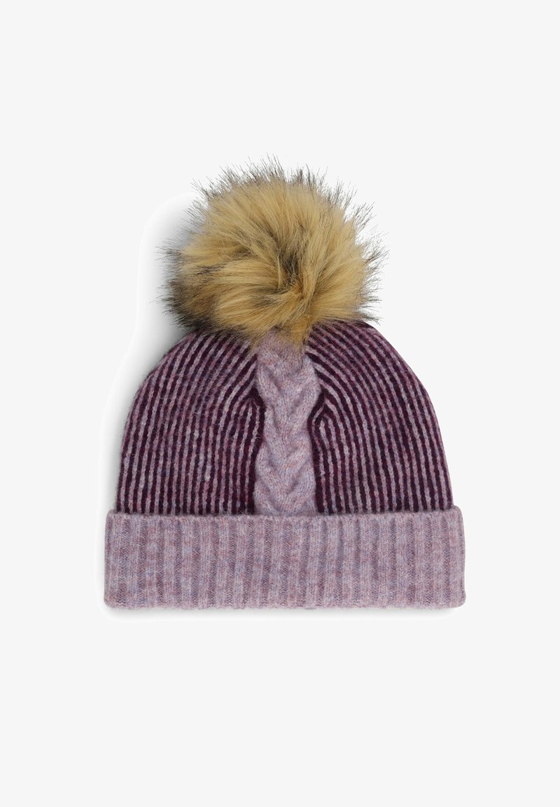 Knitted beanie in purple hues with vertical stripes and a braided pattern. Features a fluffy tan pom-pom on top and a ribbed cuff.