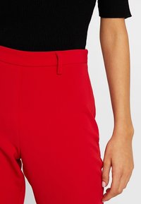 Nly by Nelly Broek - red