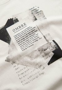 Forme astratte stratificate in nero e grigio con testo sovrapposto intitolato "OMBRE" che spiega l'arte dell'equilibrio e dell'armonia del design.