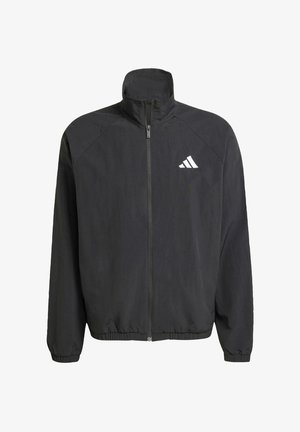 Černá zipová bunda s vysokým límcem; vyrobena z lehkého materiálu. Obsahuje bílé logo na hrudi a elastické manžety a lem.