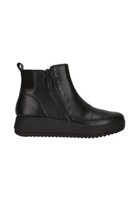 Bottine en cuir noir avec fermeture éclair, petits clous métalliques sur le côté extérieur, languette à l'arrière et semelle épaisse rainurée.