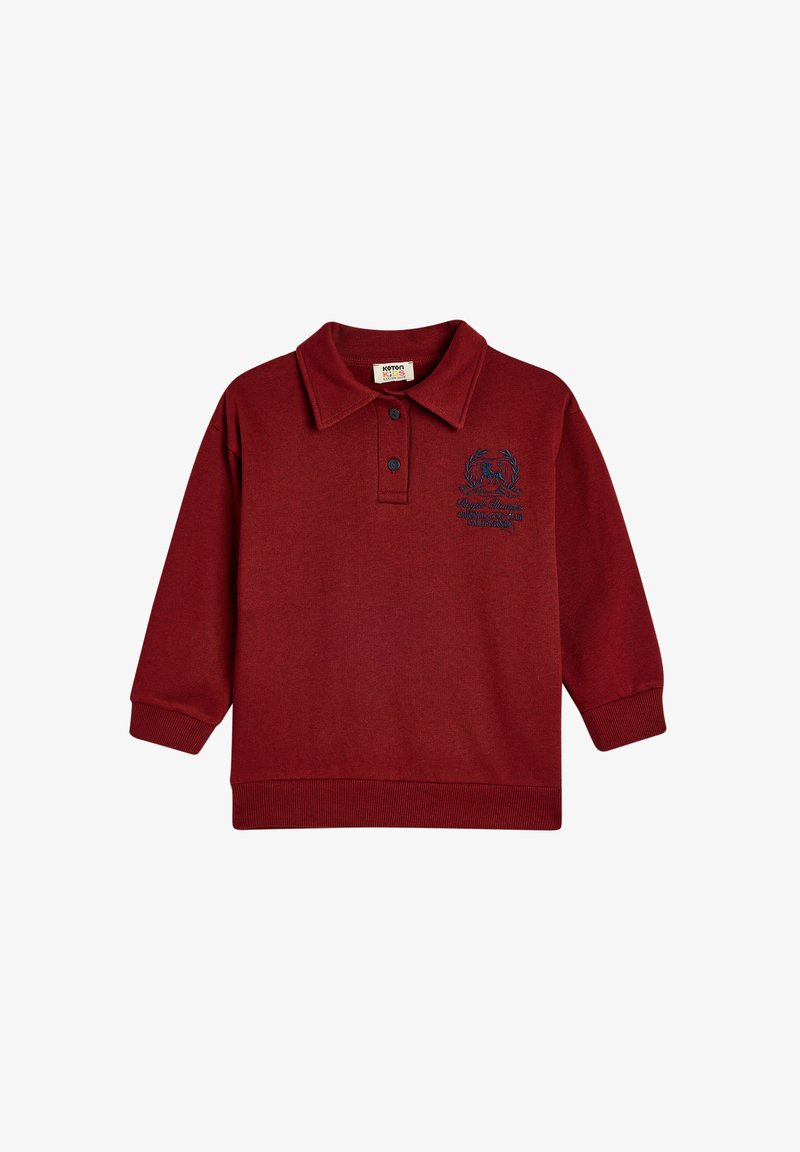 Maroonsininen puuvillapoolopaita, jossa on pitkät hihat, ribbireunukset ja kaulus; rintataskussa sininen brodeerattu logo.