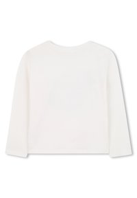 Biała, krótka, długosleeve koszula z miękkiej bawełny. Posiada okrągły kołnierz i prosty dół, bez widocznych wzorów czy akcentów.