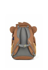 Brauner Kinder-Rucksack mit Löwendesign, ausgestattet mit grauen Netzträgern, runden Ohren und verstellbaren Schnallen. Strukturierter Stoff und Seitentaschen.