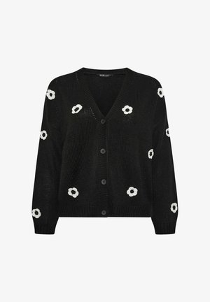 Black knitted cardigan featuring a V-neck, five buttons, and white flower embellishments scattered across the front. Textured fabric.