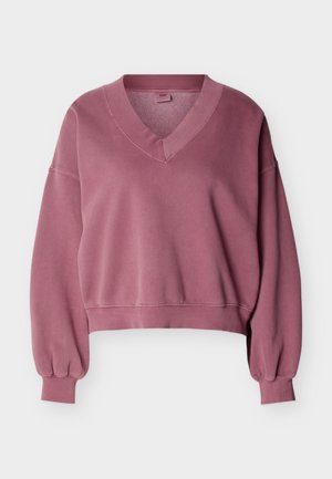 Mauve cropped sweatshirt with V-neckline, long puffed sleeves, ribbed cuffs, and ribbed waistband on a white background.