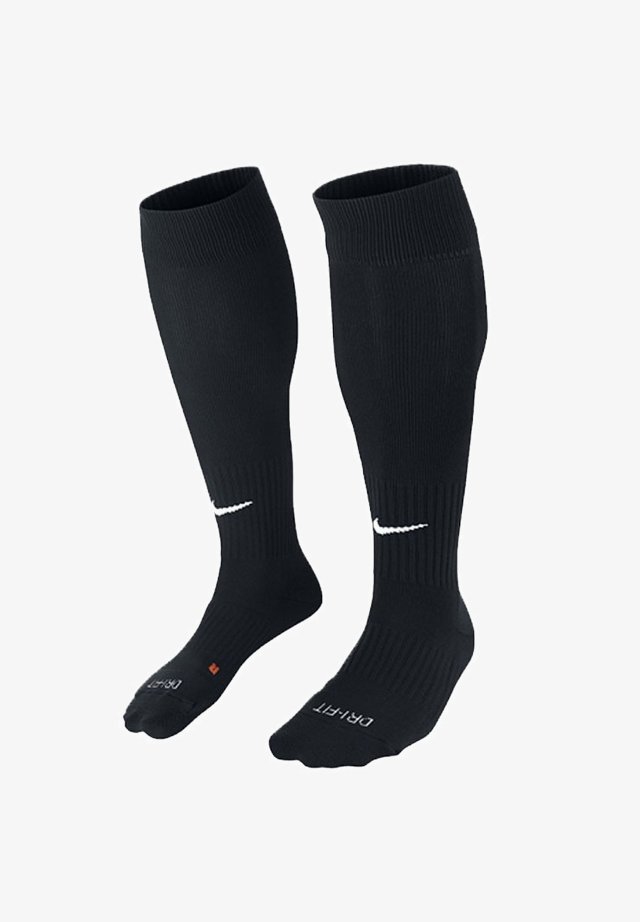 Schwarze Fußballsocken mit geripptem Muster und weißem Nike-Logo; knöchelhoch mit gepolstertem Fußbett und verstärktem Zehenbereich.
