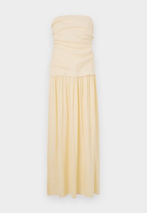 Strapless, floor-length dress in light yellow cotton. Gathered bodice with pleated skirt for a soft flow. Smooth texture and minimal design.