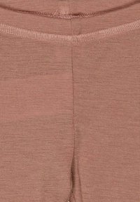 Lichtroze katoenen leggings met een textuurafwerking, voorzien van een eenvoudige elastische tailleband en gestikte naden. Geen verdere patronen of accenten.