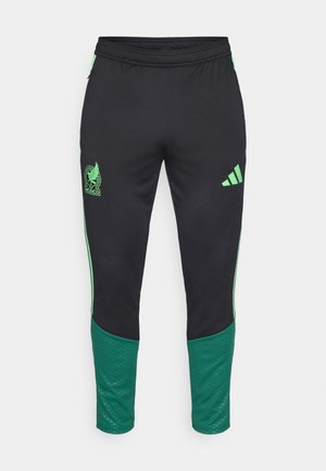 Črne in zelene športne hlače z elastičnim pasom, logotip nogometne ekipe Mehike na levi stegnenici, Adidasov logotip na desni stegnenici ter zožene hlačnice.