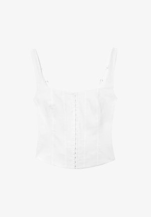 Top court blanc ajusté sans manches avec bretelles fines réglables et fermeture devant à agrafes, conçu pour les femmes.
