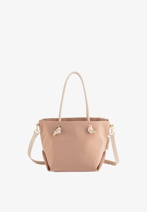 Tasche aus weichem, pinkfarbenem Silikon mit cremefarbenen Griffen, goldenen Hardware-Elementen und geknoteten Details. Abnehmbarer Schultergurt ist enthalten.