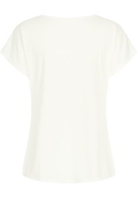 T-shirt blanc à manches courtes avec une coupe décontractée. Tissu doux, encolure ronde et texture lisse. Aucun motif ni accent visible.
