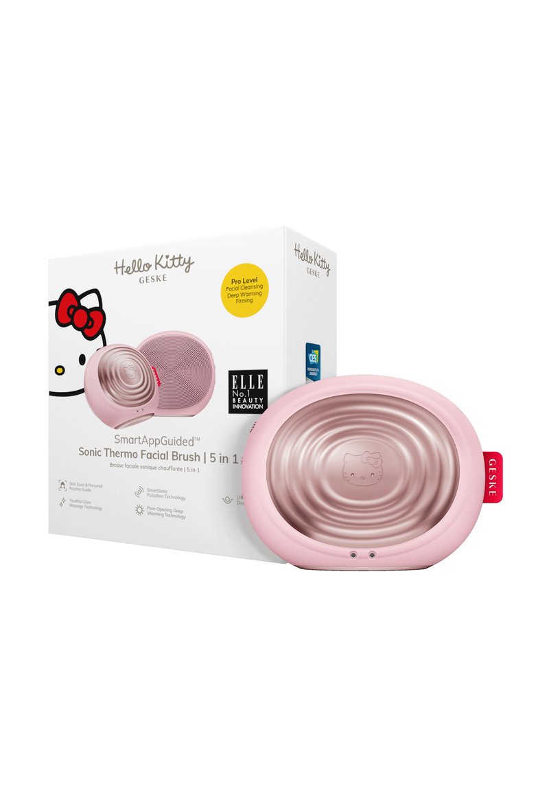 Sonic ansiktsborste med en glänsande rosa plastutsida med en Hello Kitty-design, förpackad i en vit låda med färgglada accenter och text.